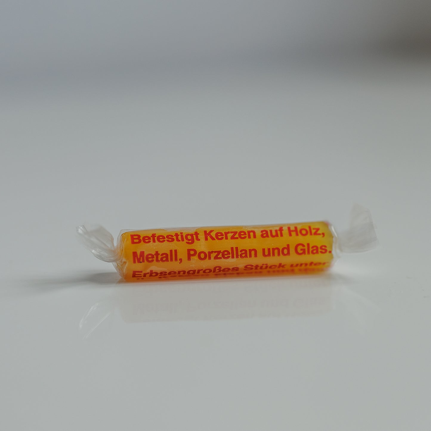 Klebevosk til å feste lys