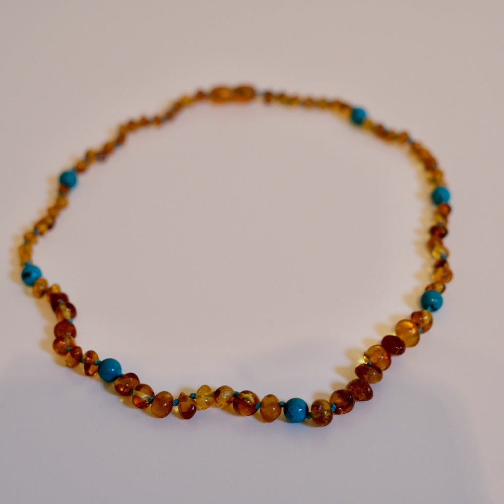 Ravsmykke cognac/green turquoise, voksen