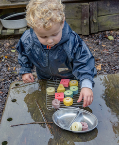 Sensory play stones - Threading Kebabs