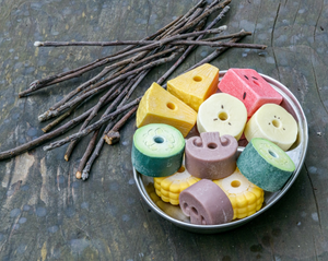 Sensory play stones - Threading Kebabs